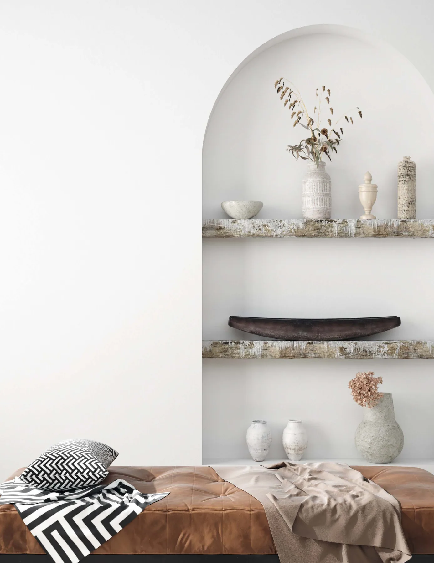 Arched display shelves with pale ceramic vessels above a tan leather bench.